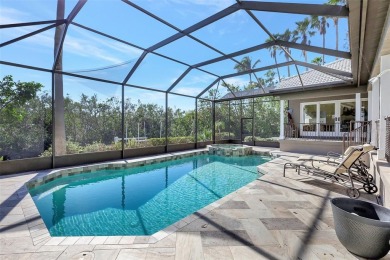 This stunning 4-bedroom home, located on the tranquil Bay Isles on Longboat Key Golf Club in Florida - for sale on GolfHomes.com, golf home, golf lot