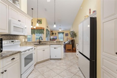 This meticulously maintained Grand Isle II model home in the on Plantation Golf Club in Florida - for sale on GolfHomes.com, golf home, golf lot