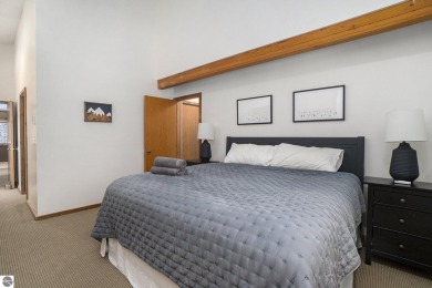 Experience the best of resort living in this fully furnished on Schuss Mountain Golf Club in Michigan - for sale on GolfHomes.com, golf home, golf lot