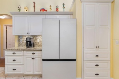 This meticulously maintained Grand Isle II model home in the on Plantation Golf Club in Florida - for sale on GolfHomes.com, golf home, golf lot