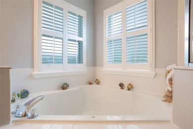 This meticulously maintained Grand Isle II model home in the on Plantation Golf Club in Florida - for sale on GolfHomes.com, golf home, golf lot