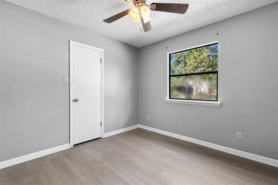 Charming Corner Lot nestled in the serene, gated community of on Holly Lake Ranch Golf Club in Texas - for sale on GolfHomes.com, golf home, golf lot