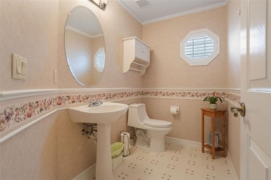 This meticulously maintained Grand Isle II model home in the on Plantation Golf Club in Florida - for sale on GolfHomes.com, golf home, golf lot