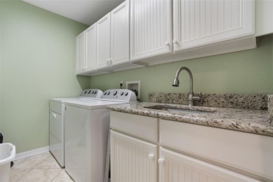 This meticulously maintained Grand Isle II model home in the on Plantation Golf Club in Florida - for sale on GolfHomes.com, golf home, golf lot
