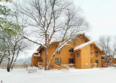 Experience the best of resort living in this fully furnished on Schuss Mountain Golf Club in Michigan - for sale on GolfHomes.com, golf home, golf lot