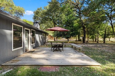 Charming Corner Lot nestled in the serene, gated community of on Holly Lake Ranch Golf Club in Texas - for sale on GolfHomes.com, golf home, golf lot