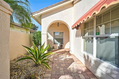 Start the new year in this beautifully maintained 2BR/2BA plus on Peridia Golf and Country Club in Florida - for sale on GolfHomes.com, golf home, golf lot