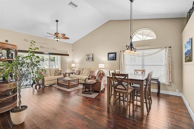Start the new year in this beautifully maintained 2BR/2BA plus on Peridia Golf and Country Club in Florida - for sale on GolfHomes.com, golf home, golf lot