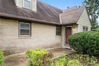 This private and secluded two story home sits on a huge, treed on Loch Lloyd Country Club in Missouri - for sale on GolfHomes.com, golf home, golf lot