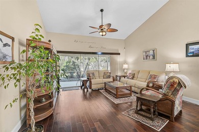 Start the new year in this beautifully maintained 2BR/2BA plus on Peridia Golf and Country Club in Florida - for sale on GolfHomes.com, golf home, golf lot