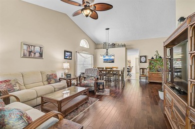 Start the new year in this beautifully maintained 2BR/2BA plus on Peridia Golf and Country Club in Florida - for sale on GolfHomes.com, golf home, golf lot