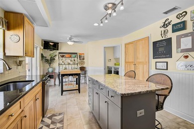 Start the new year in this beautifully maintained 2BR/2BA plus on Peridia Golf and Country Club in Florida - for sale on GolfHomes.com, golf home, golf lot