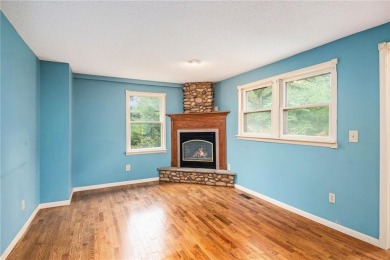 This private and secluded two story home sits on a huge, treed on Loch Lloyd Country Club in Missouri - for sale on GolfHomes.com, golf home, golf lot
