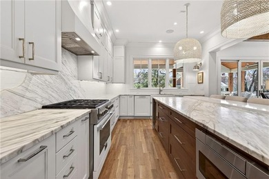 Nestled on a quiet cul-de-sac just moments from Chastain Park on North Fulton Golf Course in Georgia - for sale on GolfHomes.com, golf home, golf lot