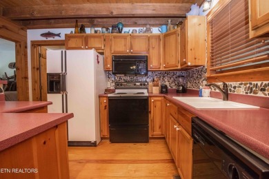 Make this adorable cabin your getaway to the Great Smoky on Laurel Valley Golf Course in Tennessee - for sale on GolfHomes.com, golf home, golf lot