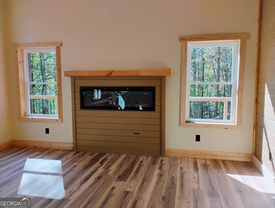 Contemporary Rustic Retreat in Coosawattee River Resort, Welcome on White Path Golf Club in Georgia - for sale on GolfHomes.com, golf home, golf lot