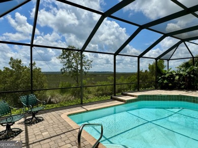 Enjoy spectacular coastal Georgia marsh views from this Osprey on The Club At Osprey Cove in Georgia - for sale on GolfHomes.com, golf home, golf lot