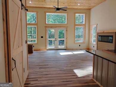 Contemporary Rustic Retreat in Coosawattee River Resort, Welcome on White Path Golf Club in Georgia - for sale on GolfHomes.com, golf home, golf lot