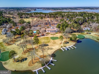 Sought after gated community at Reynolds-Lake Oconee with golf on Great Waters Course At Reynolds Plantation in Georgia - for sale on GolfHomes.com, golf home, golf lot