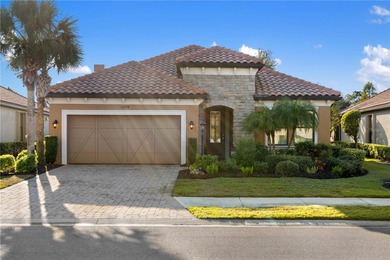 Enjoy Resort-Style Living with this beautifully upgraded Piceno on Esplanade Golf and Country at Lakewood Ranch in Florida - for sale on GolfHomes.com, golf home, golf lot