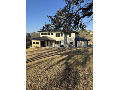 Stylish Hill Country contemporary home backing up to the #1 tee on Apple Rock Golf Course - Horseshoe Bay in Texas - for sale on GolfHomes.com, golf home, golf lot
