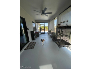 Come see this beautiful corner property with contemporary light on Copperhead Golf Club in Florida - for sale on GolfHomes.com, golf home, golf lot