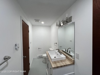 Located among a golf course, fishing spots and pools, tennis on Pocono Farms Country Club in Pennsylvania - for sale on GolfHomes.com, golf home, golf lot