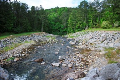 Stunning .58 acre lot available on a cul-de-sac in the mountain on The Highlands Course at Lake Arrowhead in Georgia - for sale on GolfHomes.com, golf home, golf lot