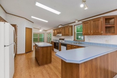 Love the peaceful lakeside living and exciting recreational on Linn Valley Lakes - Deer Trace Golf Course in Kansas - for sale on GolfHomes.com, golf home, golf lot