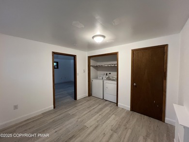 Located among a golf course, fishing spots and pools, tennis on Pocono Farms Country Club in Pennsylvania - for sale on GolfHomes.com, golf home, golf lot