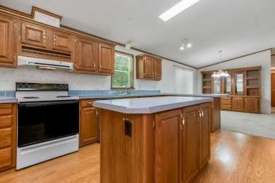 Love the peaceful lakeside living and exciting recreational on Linn Valley Lakes - Deer Trace Golf Course in Kansas - for sale on GolfHomes.com, golf home, golf lot