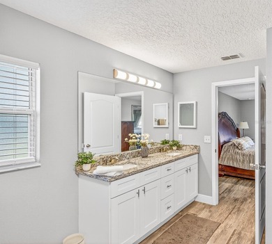 Links-Front Living: Fully Renovated & Move-In Ready on the 14th on Black Bear Golf Club in Florida - for sale on GolfHomes.com, golf home, golf lot