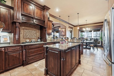 Welcome to this exceptional home overlooking the 14th hole at on Centennial Valley Golf Course in Arkansas - for sale on GolfHomes.com, golf home, golf lot