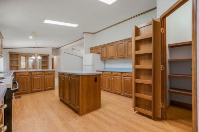 Love the peaceful lakeside living and exciting recreational on Linn Valley Lakes - Deer Trace Golf Course in Kansas - for sale on GolfHomes.com, golf home, golf lot