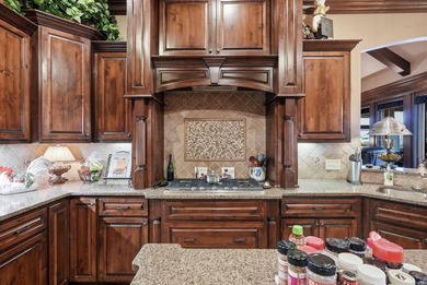 Welcome to this exceptional home overlooking the 14th hole at on Centennial Valley Golf Course in Arkansas - for sale on GolfHomes.com, golf home, golf lot