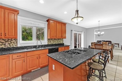 Welcome to this stunning colonial brick home in the highly on The Orchards Golf Club in Michigan - for sale on GolfHomes.com, golf home, golf lot