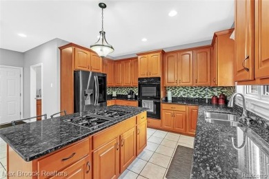 Welcome to this stunning colonial brick home in the highly on The Orchards Golf Club in Michigan - for sale on GolfHomes.com, golf home, golf lot