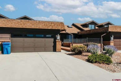 Beautiful Townhome with Mountain Views Bordering Black Canyon on Black Canyon Golf Club At Montrose in Colorado - for sale on GolfHomes.com, golf home, golf lot
