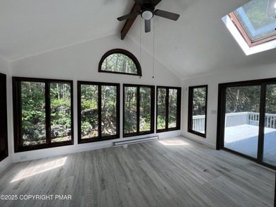 Located among a golf course, fishing spots and pools, tennis on Pocono Farms Country Club in Pennsylvania - for sale on GolfHomes.com, golf home, golf lot