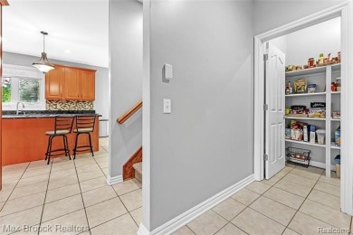 Welcome to this stunning colonial brick home in the highly on The Orchards Golf Club in Michigan - for sale on GolfHomes.com, golf home, golf lot