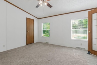 Love the peaceful lakeside living and exciting recreational on Linn Valley Lakes - Deer Trace Golf Course in Kansas - for sale on GolfHomes.com, golf home, golf lot