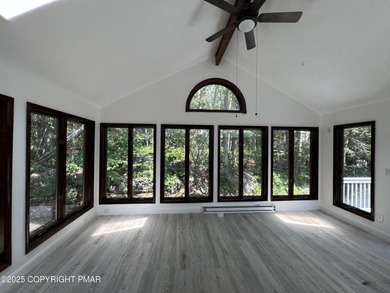 Located among a golf course, fishing spots and pools, tennis on Pocono Farms Country Club in Pennsylvania - for sale on GolfHomes.com, golf home, golf lot