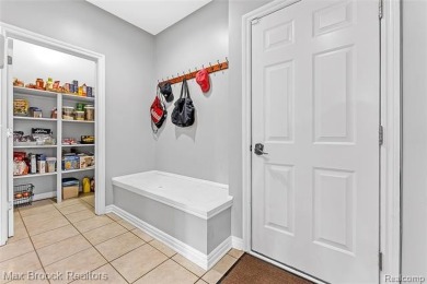 Welcome to this stunning colonial brick home in the highly on The Orchards Golf Club in Michigan - for sale on GolfHomes.com, golf home, golf lot