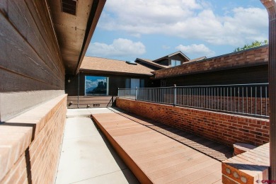 Beautiful Townhome with Mountain Views Bordering Black Canyon on Black Canyon Golf Club At Montrose in Colorado - for sale on GolfHomes.com, golf home, golf lot