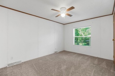 Love the peaceful lakeside living and exciting recreational on Linn Valley Lakes - Deer Trace Golf Course in Kansas - for sale on GolfHomes.com, golf home, golf lot