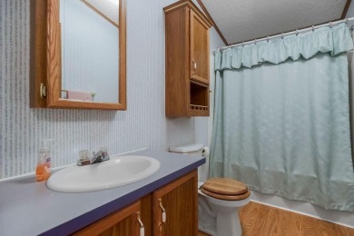 Love the peaceful lakeside living and exciting recreational on Linn Valley Lakes - Deer Trace Golf Course in Kansas - for sale on GolfHomes.com, golf home, golf lot
