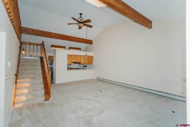 Beautiful Townhome with Mountain Views Bordering Black Canyon on Black Canyon Golf Club At Montrose in Colorado - for sale on GolfHomes.com, golf home, golf lot