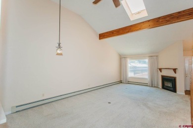 Beautiful Townhome with Mountain Views Bordering Black Canyon on Black Canyon Golf Club At Montrose in Colorado - for sale on GolfHomes.com, golf home, golf lot