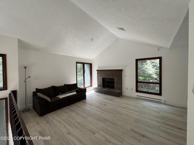 Located among a golf course, fishing spots and pools, tennis on Pocono Farms Country Club in Pennsylvania - for sale on GolfHomes.com, golf home, golf lot