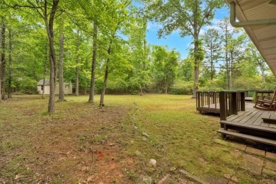 Discover this charming 3-bedroom, 2-bath ranch-style home on Fairfield Plantation Golf and Country Club in Georgia - for sale on GolfHomes.com, golf home, golf lot